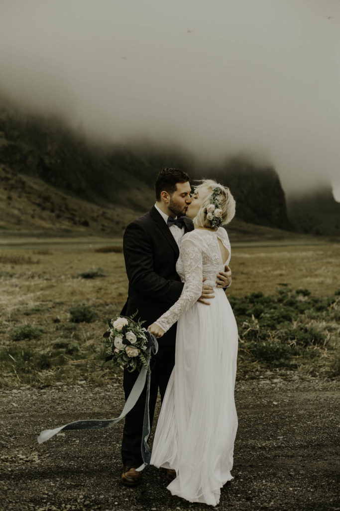 elopement with fog and Icelandic mountains.