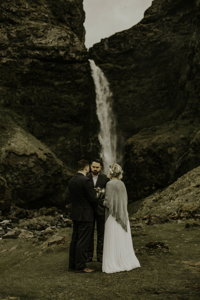 bride and groom private waterfall with officiant