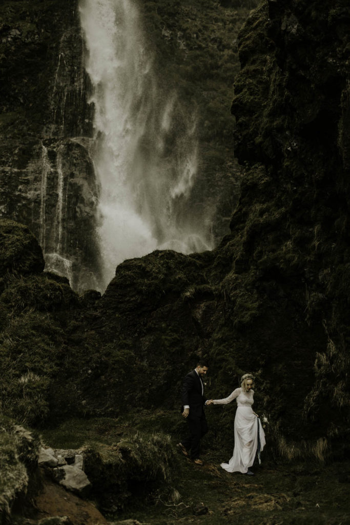 adventure elopement next to a waterfall in southern Iceland
