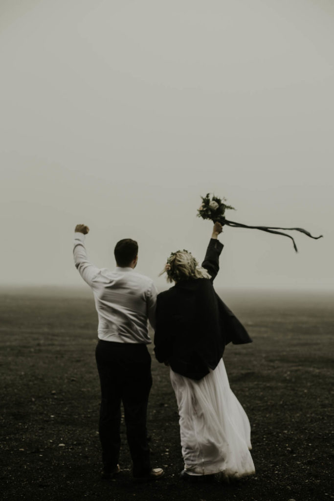 bride and groom foggy black rock