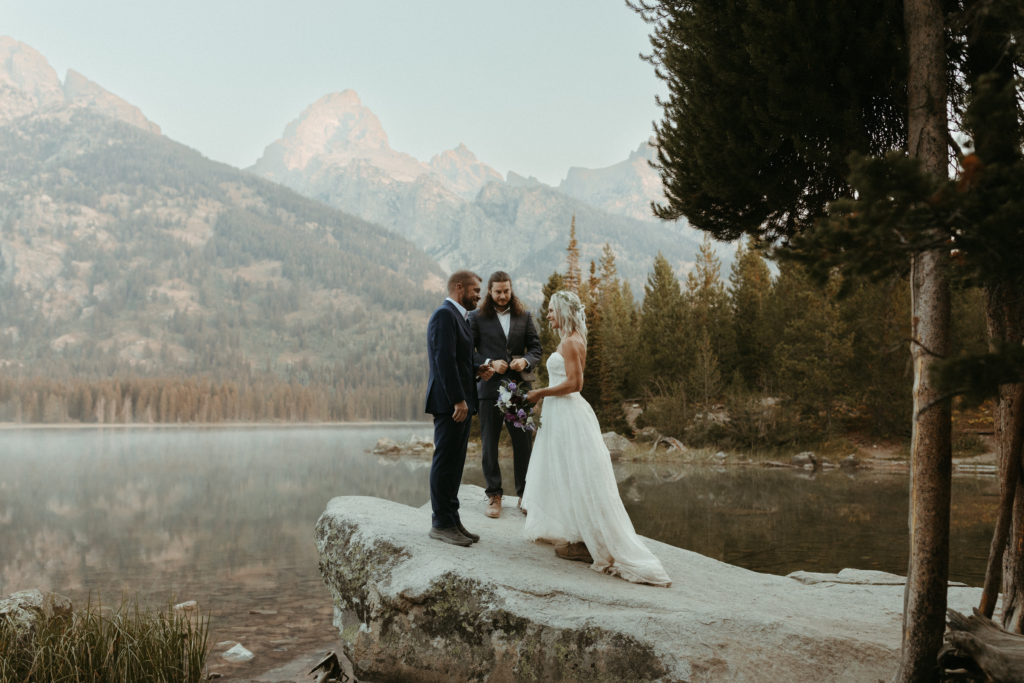 Grand Teton elopement ceremony at sunrise in National Park. 